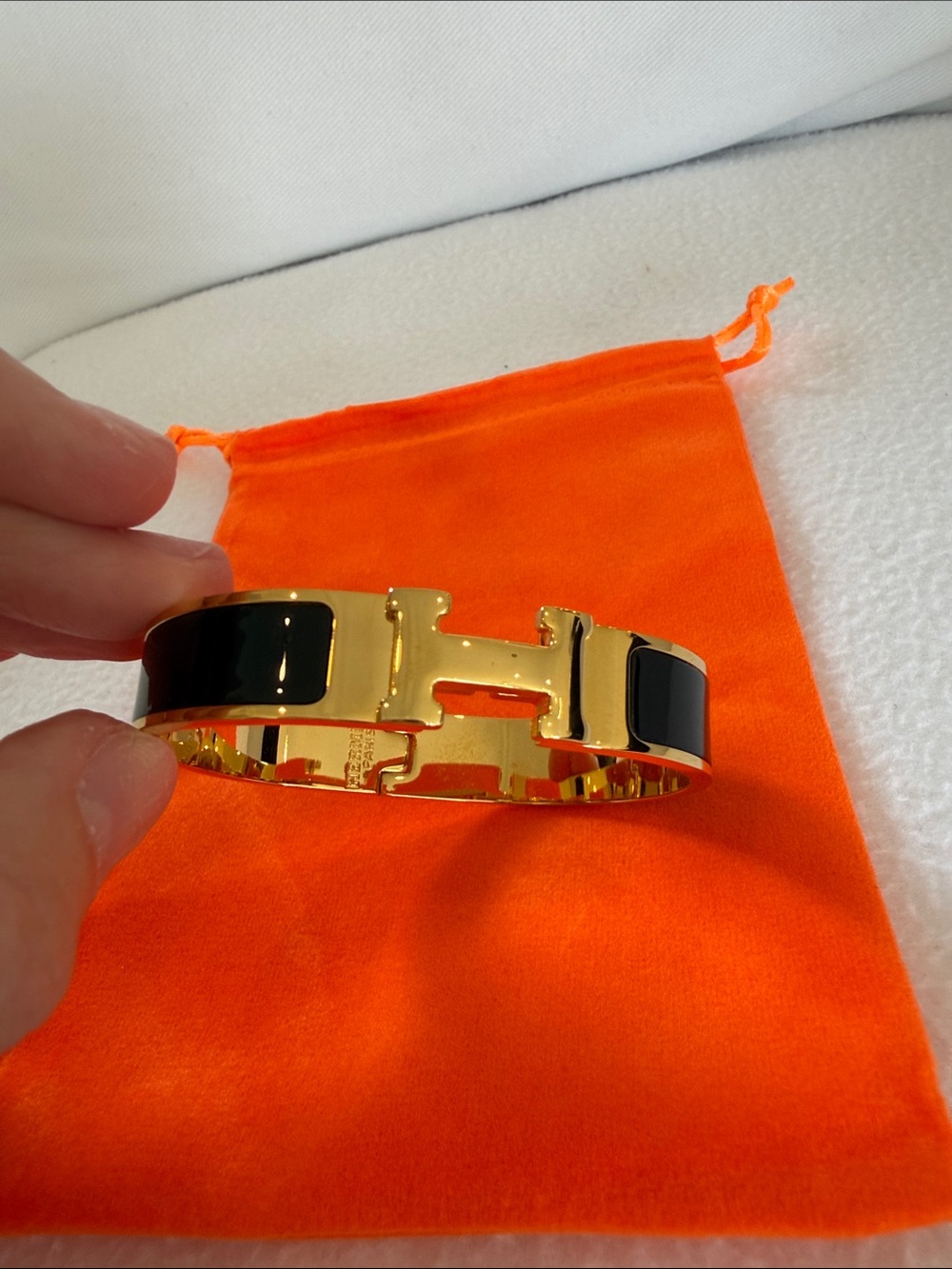 Gold-Tone Hermes Clic Bracelet with Black Enamel